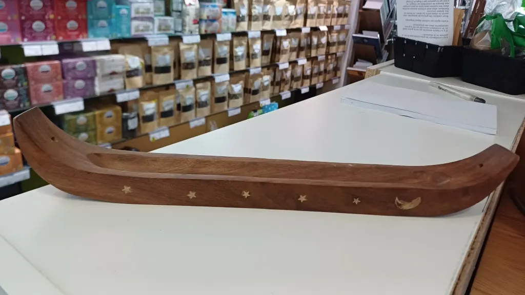Porte encens bois en forme de pirogue